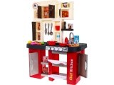 Kitchen with fridge, water tap
