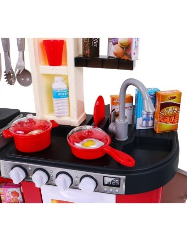 Kitchen with fridge, water tap